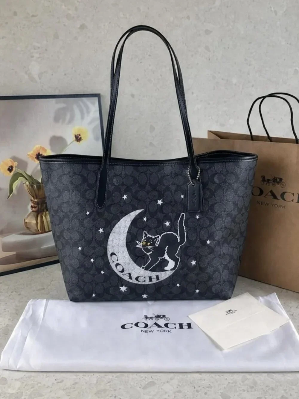 COACH Black Signature Canvas Tote with Moon & Cat Motif